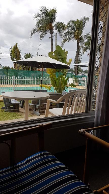 South Pacific Palms Motor Inn - Accommodation NSW 4