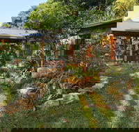 Palm Grove Rainforest Retreat - Accommodation NSW