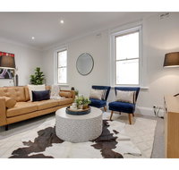 Large stylish and quiet penthouse steps from surf - Accommodation NSW