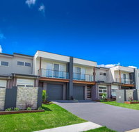 Escape At Nobbys Executive Townhouse 1 74 Pacific Drive - Accommodation NSW