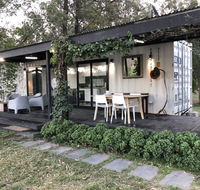 Absolute riverfront shipping container cabin - Accommodation NSW