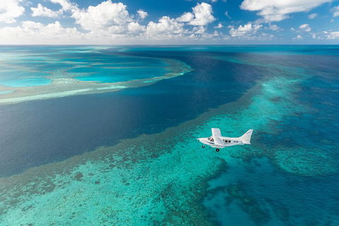 Great Barrier Reef Scenic Flight And Ocean Rafting Whitehaven Beach Day Trip - Accommodation NSW 3
